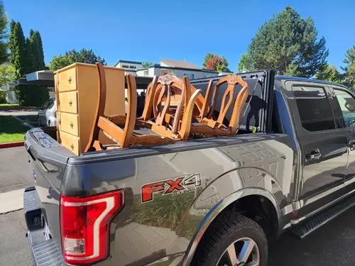 On the way to deliver a house full of furniture to a mom and her 2 kids